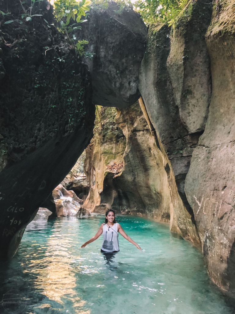 The crystal blue waters and limestone rocks I found as I hike La Plaza, one of the best places to visit in the Dominican Republic