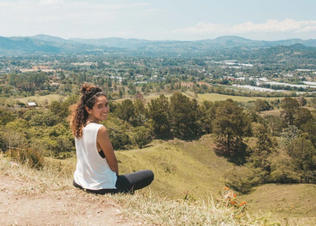 A woman enjoying the views in the Jarabacoa region of the Dominican Republic.