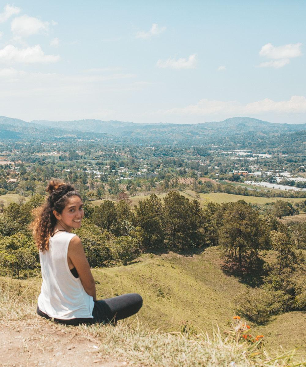 A woman enjoying the views in the Jarabacoa region of the Dominican Republic.