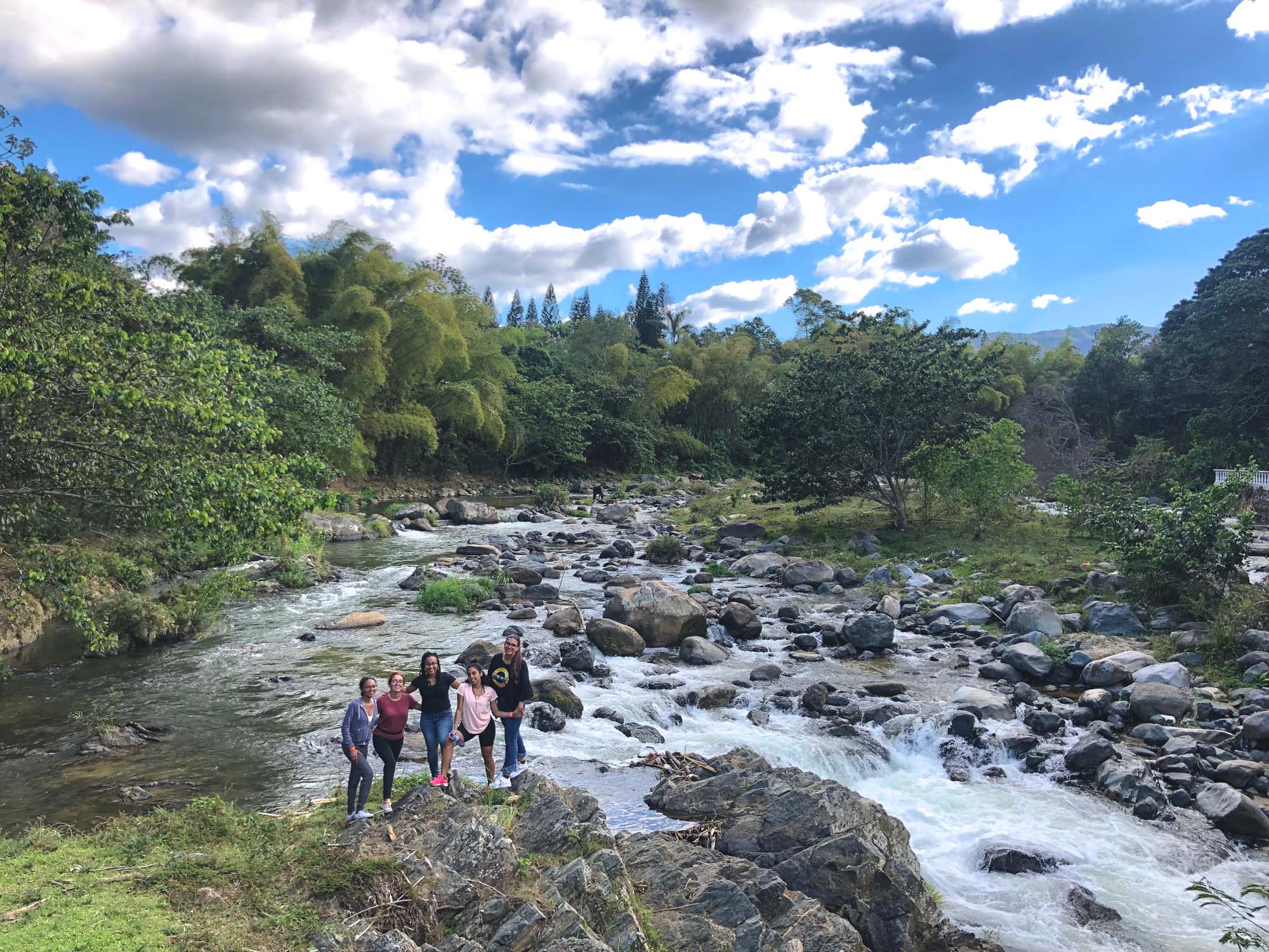 Five women at the beautiful Rio Jimenoa in Jarabacoa.