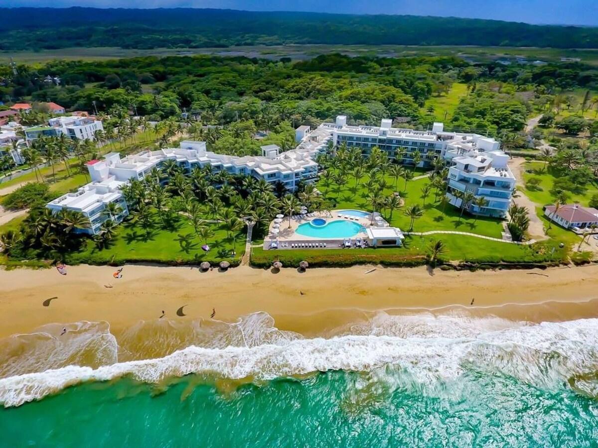 An aerial view of a resort by the sea in the Dominican Republic.