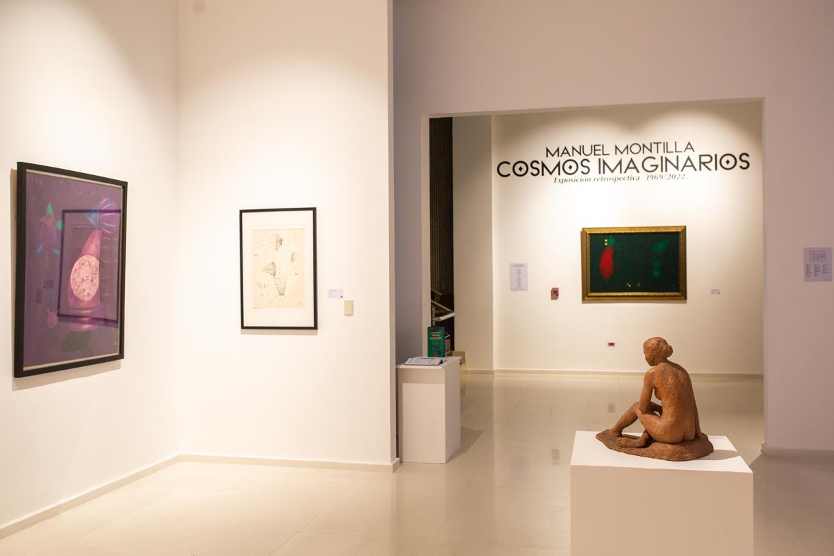 A museum gallery with paintings.