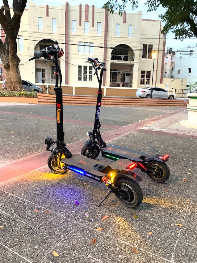 Two electric scooters parked at La Zona Colonial.