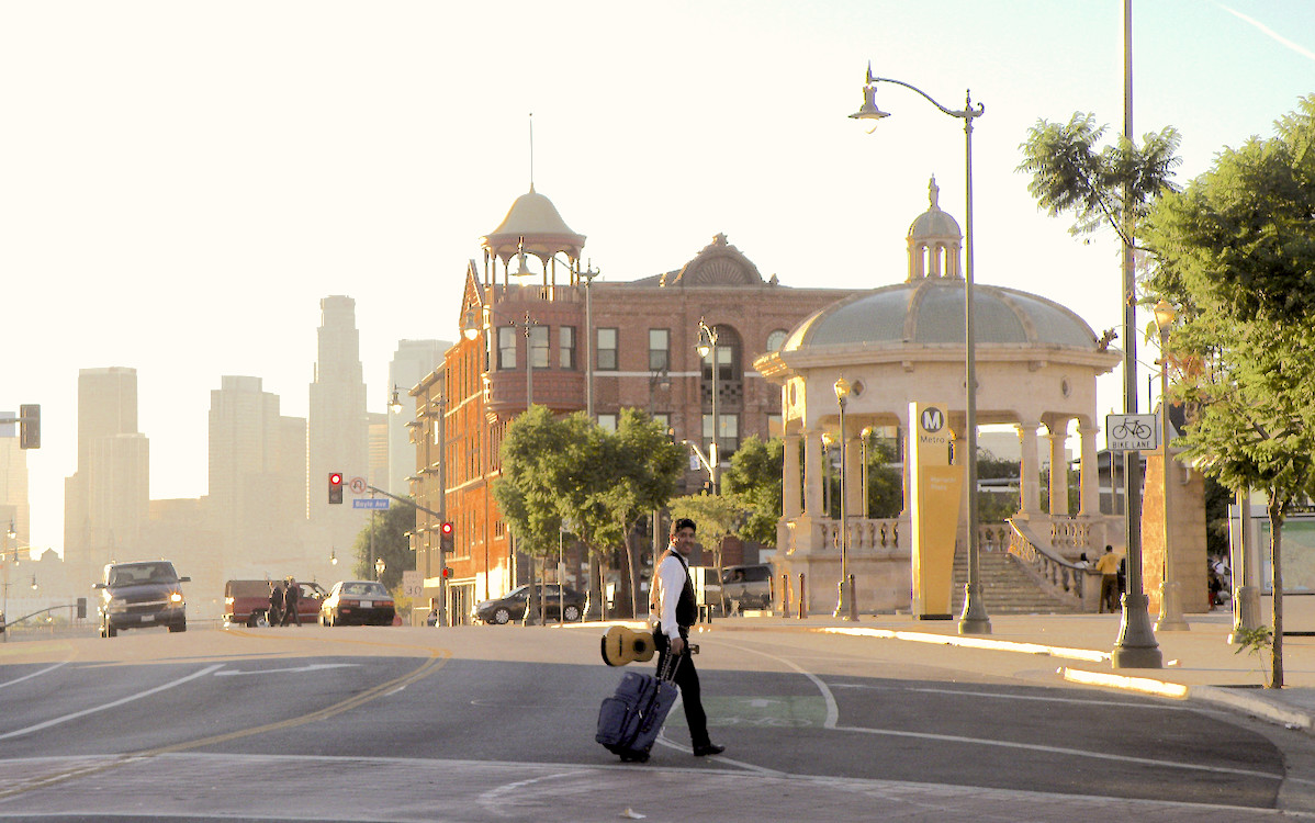 mariachi crossing the street in boyle heights