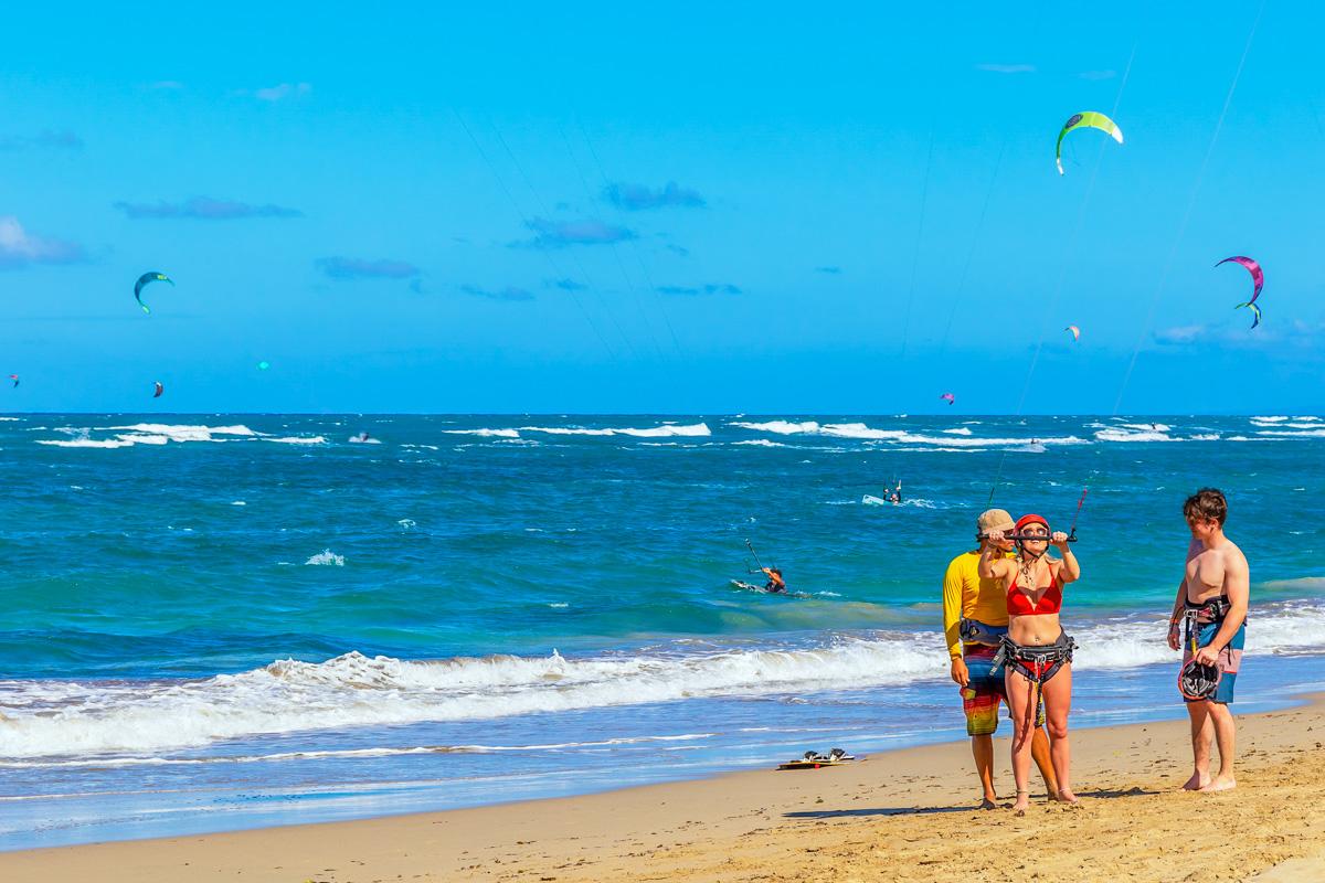 People kitesurfing at Cabarete Beach, one of the beaches in Puerto Plata.