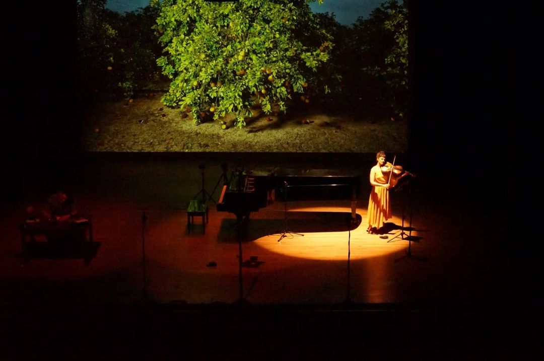 a performer in san antonio playing the violin