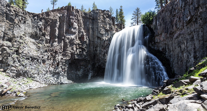 Waterfall cascade on a natural pool.