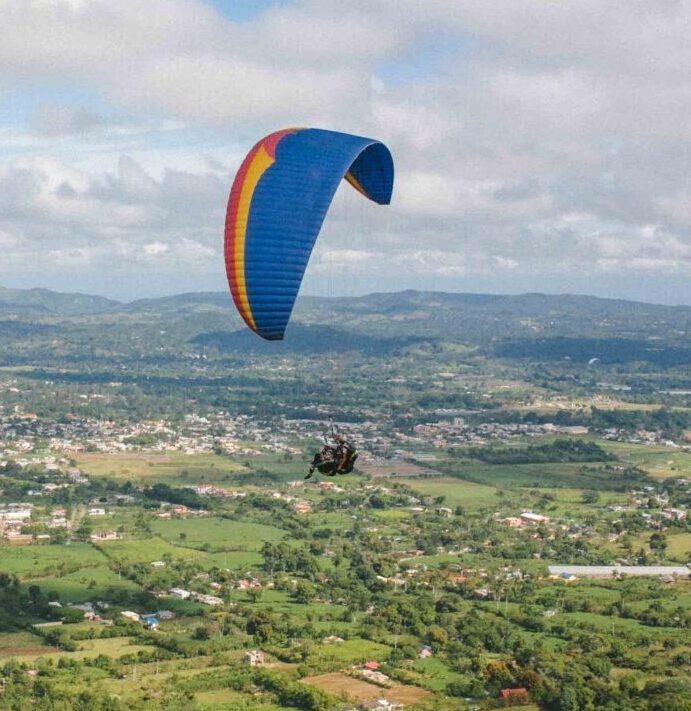 Paragliding above the Dominican Alps