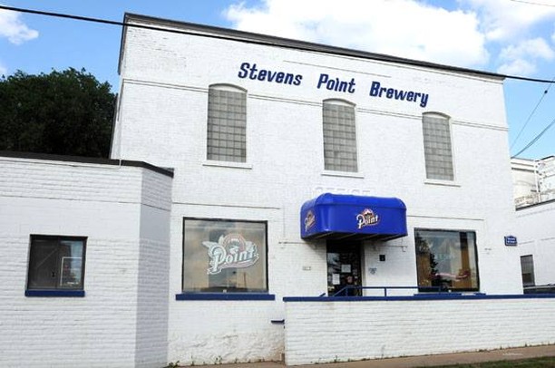Infront of the brewery with huge letters on the facade.