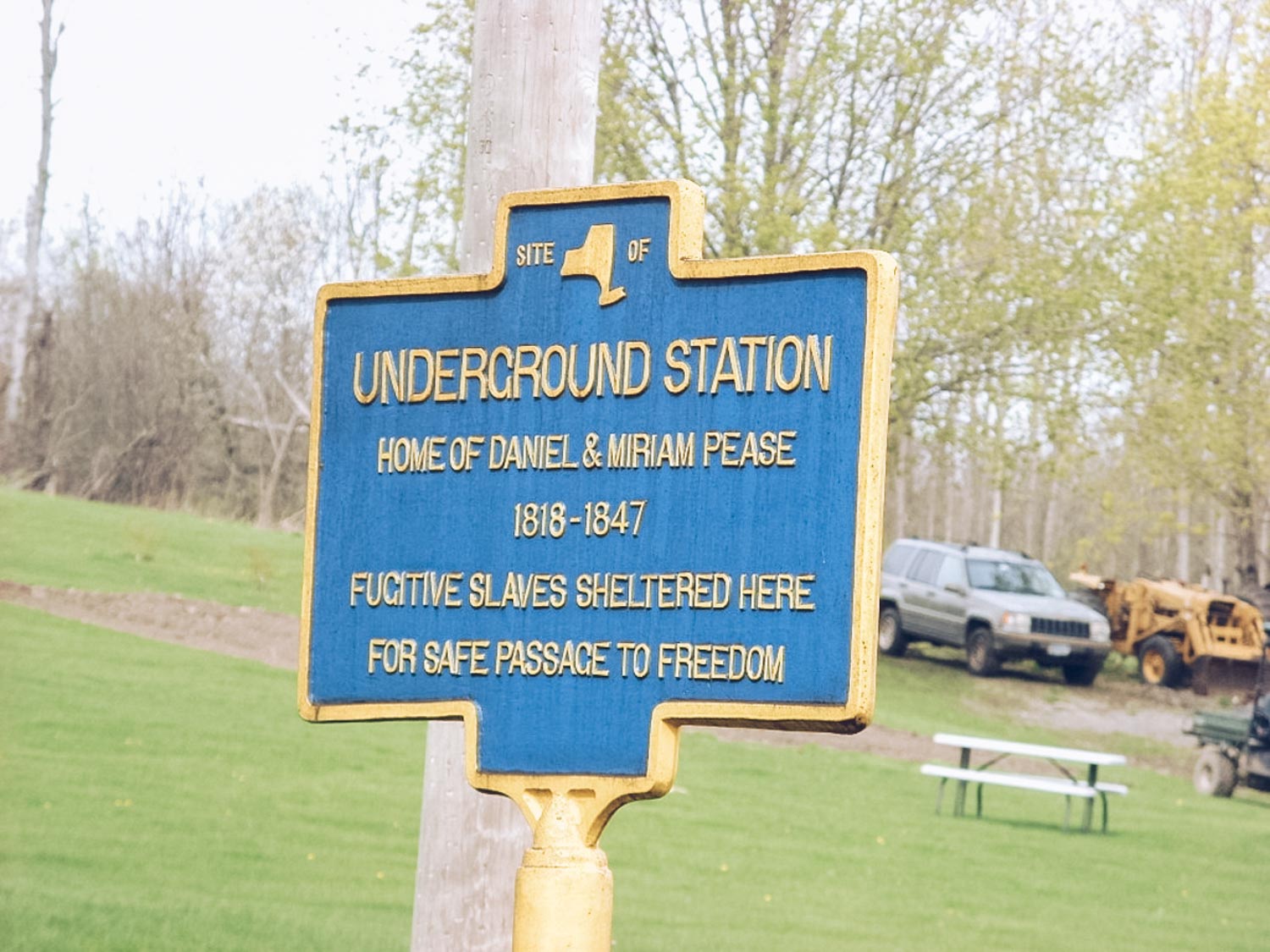 A sign that says "Underground Station" and details