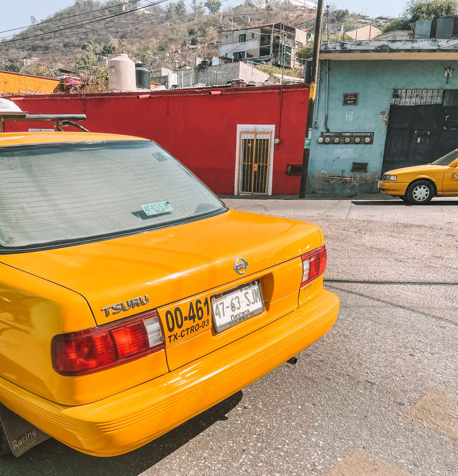 Yellow taxi in Oaxaca.