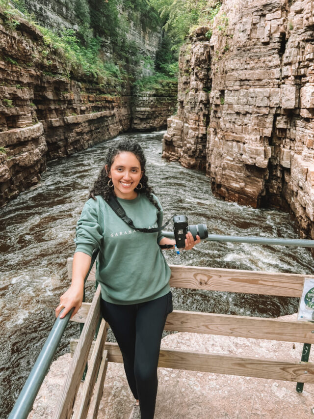 girl w camera over looking the gorge