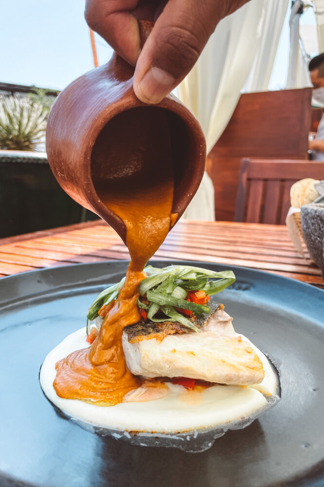 Fish and vegetable on plate.
