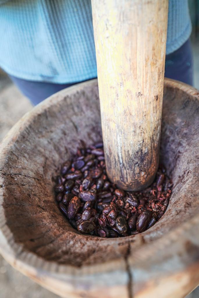 Cacao beans being on a grind.