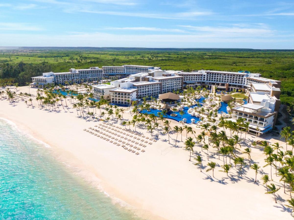 The beach and outdoor swimming pool area of a resort in the Dominican Republic.