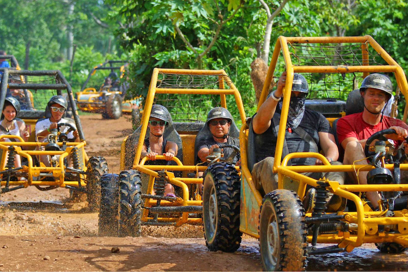 People on dune buggy rides.
