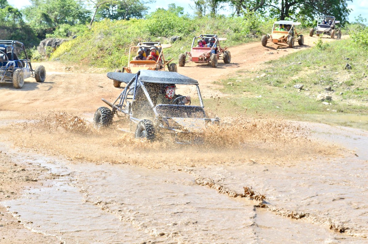 People riding ATVs, one of the things to do in Punta Cana.