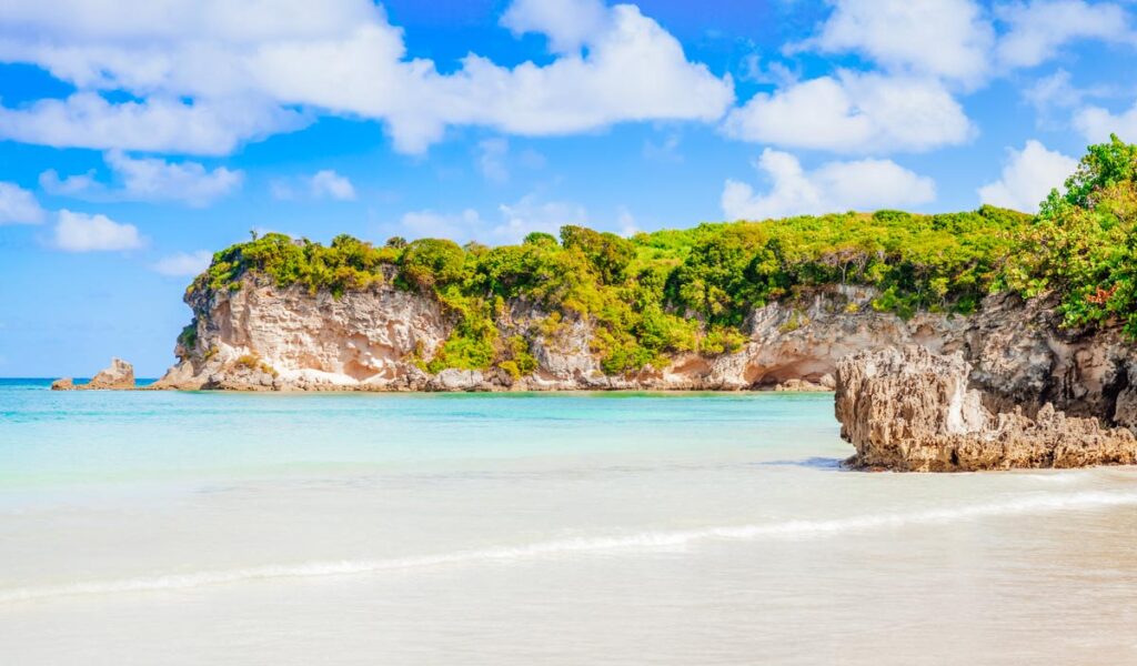 blue beach with rocks