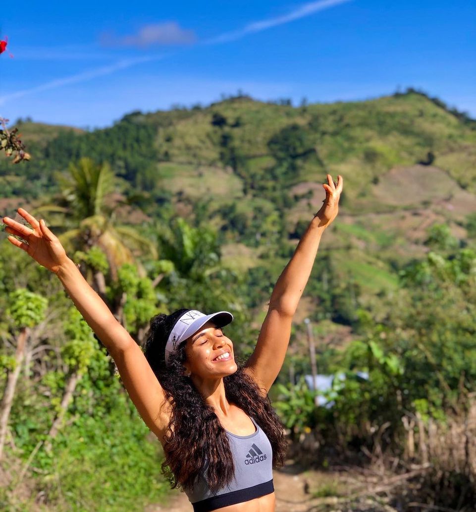 A woman hiking at Pico Diego Ocampo.