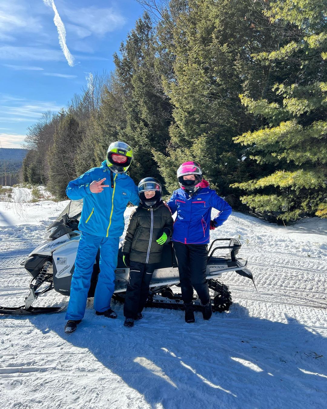 people snowmobiling in new york
