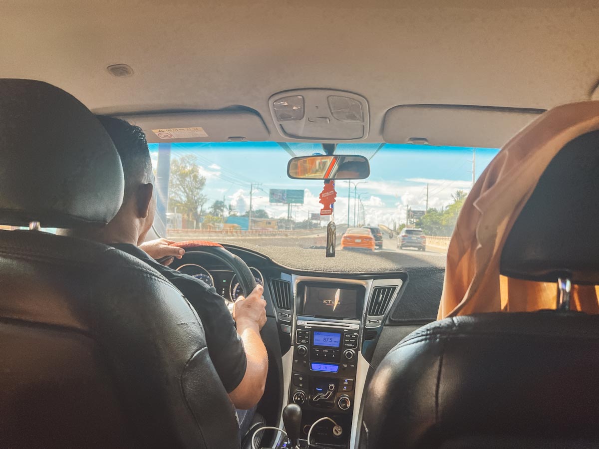 A man driving a car in Punta Cana.