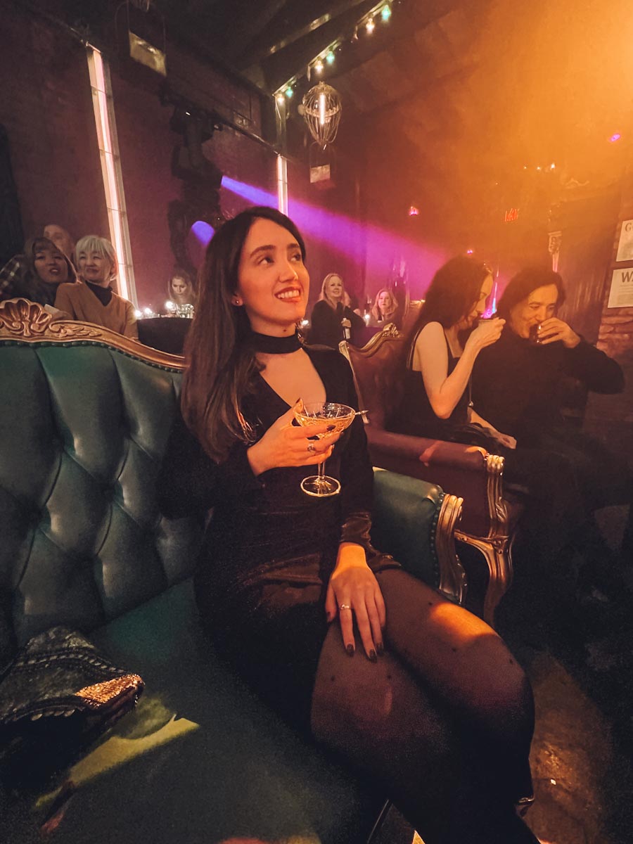 A woman watching Nutcracker Rouge in NYC in December
