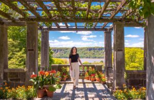 A woman in at Wave Hill Garden