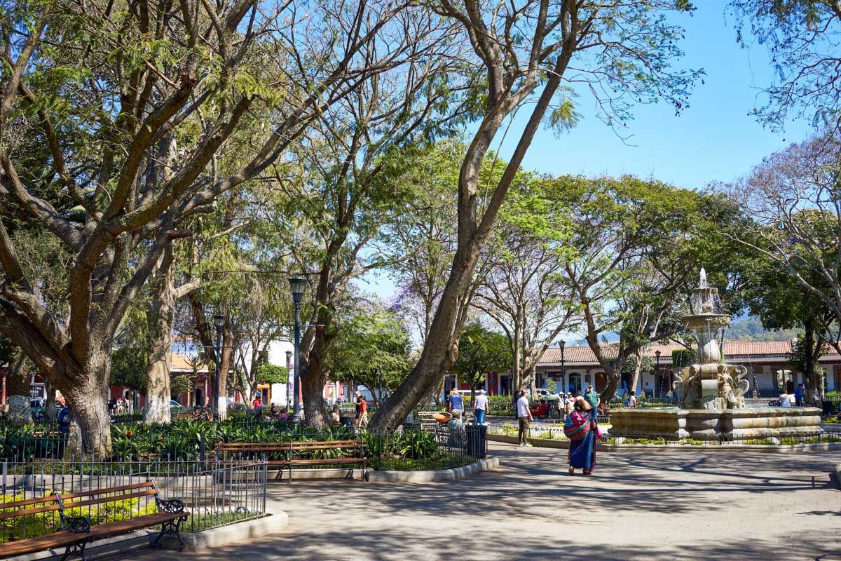 People in Parque Central, Antigua, Guatemala in the morning