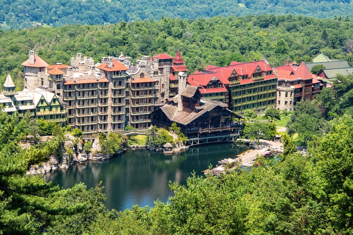 Mohonk House with lake and surrounded by trees