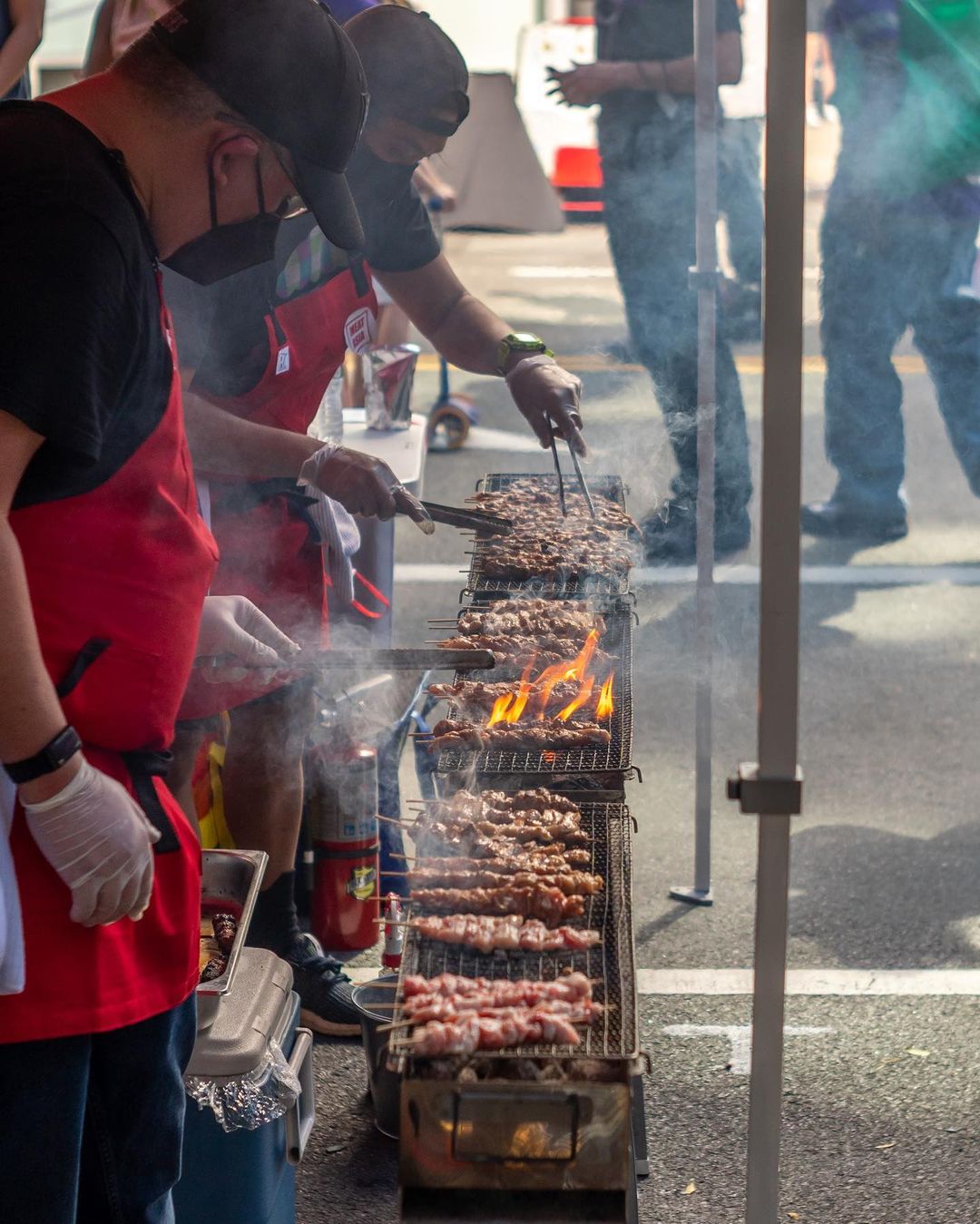 Men grilling barbecues at the Atlantic Antic