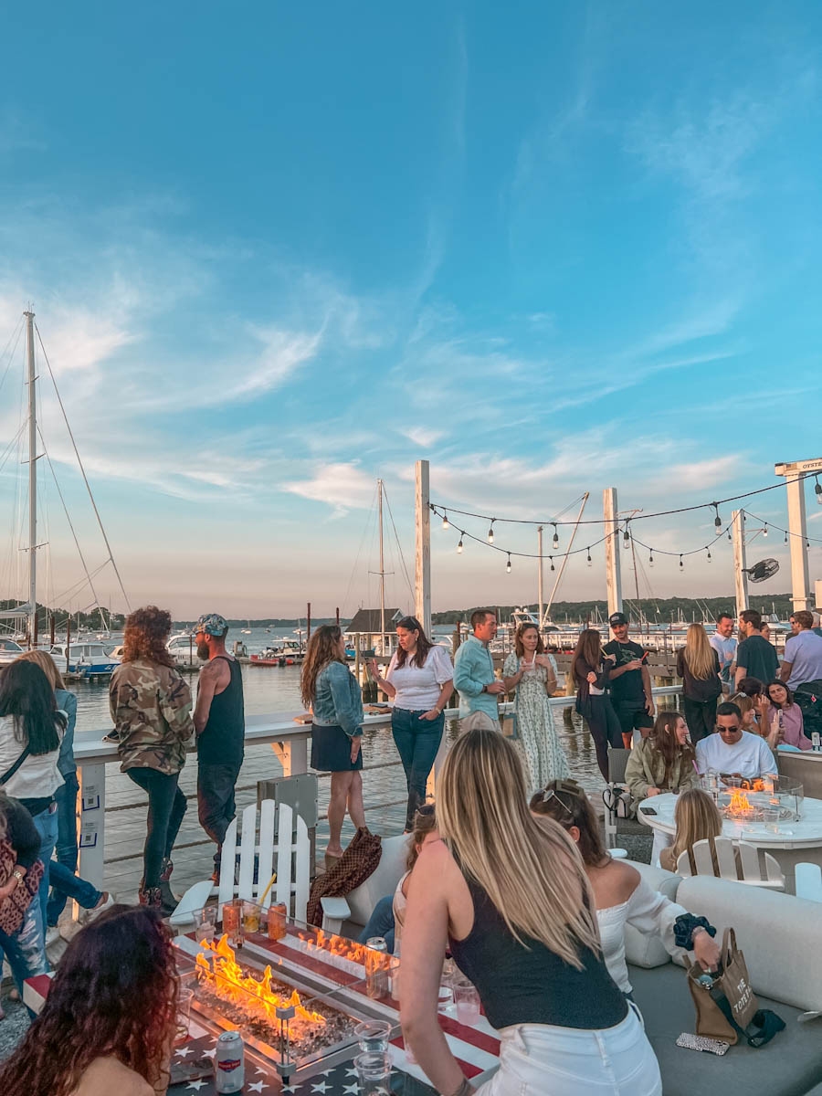 People socializing at Cooper Bluff Waterfront Bar