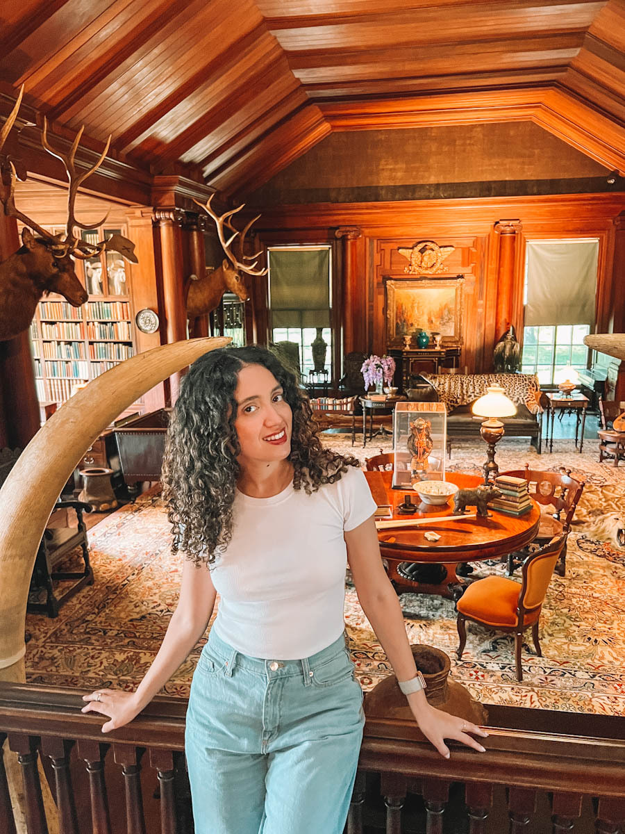 A woman on a Sagamore Hill Roosevelt House Tour in Oyster Bay, Long Island