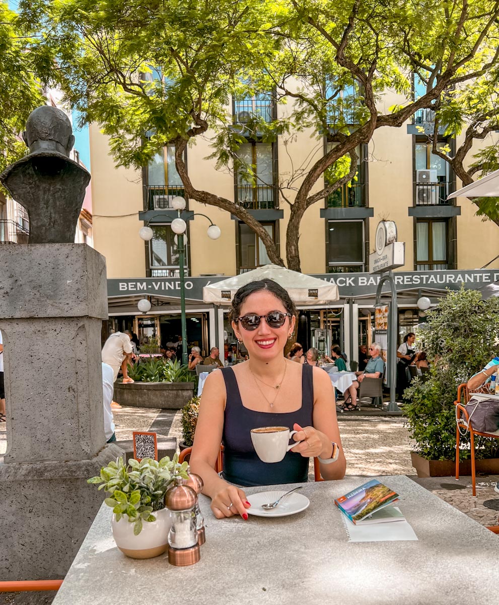 A woman drinking coffee at Barcelo in Funchal, Madeira