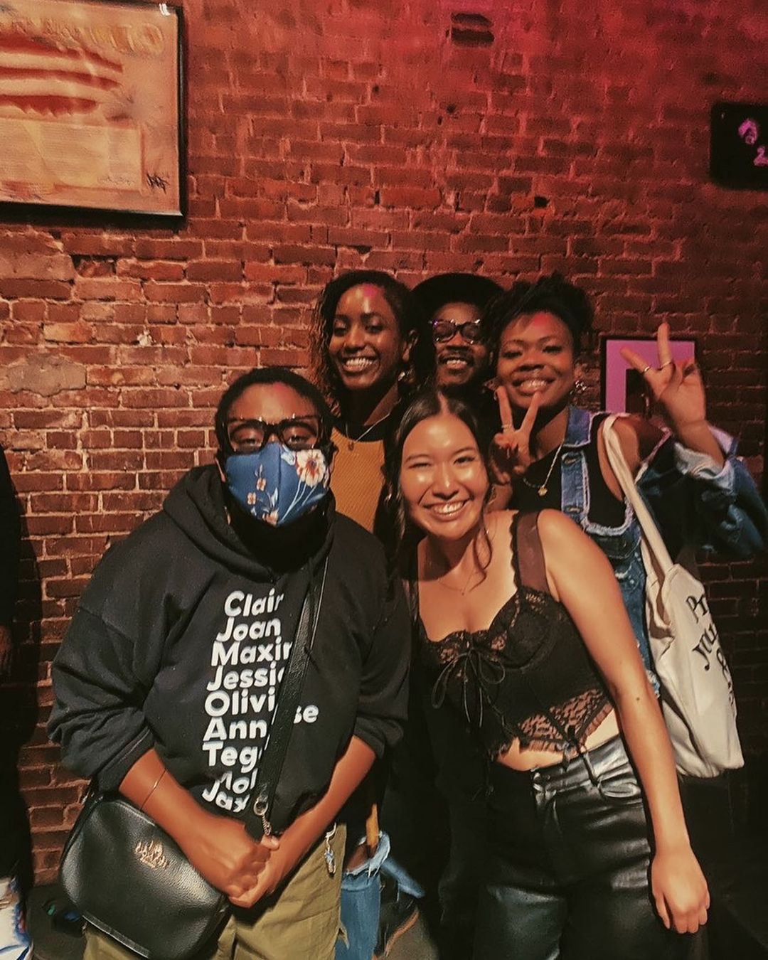 A group of people in Nuyorican Poet’s Cafe, New York City