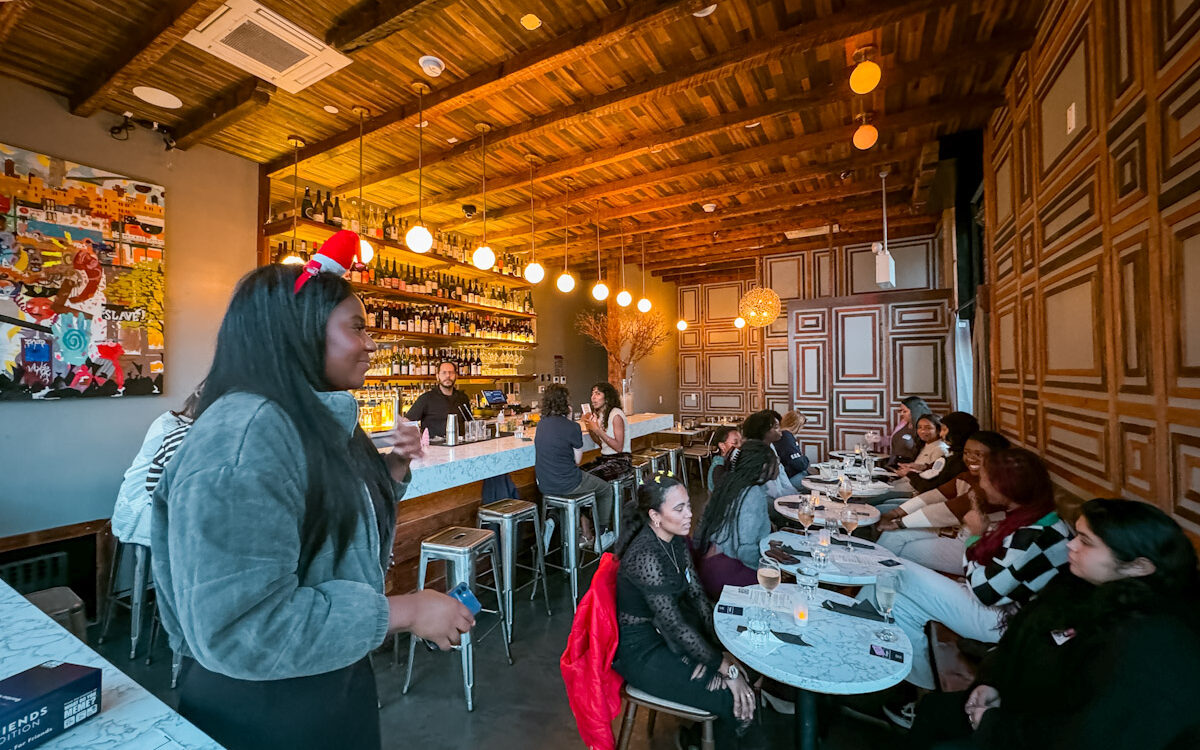 Women gathering at a bar, indoor things to do in New York City