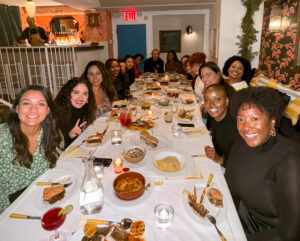 A group of women having dinner as a way of making friends in NYC.