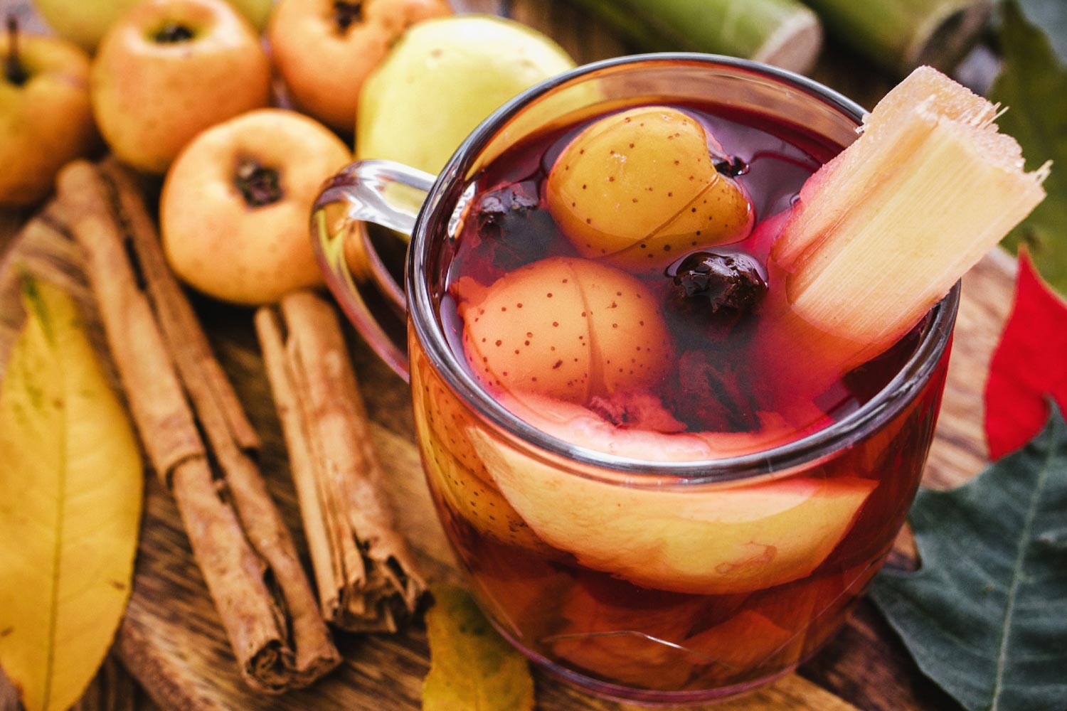 Ponche Guatemalan drink in a clear glass cup